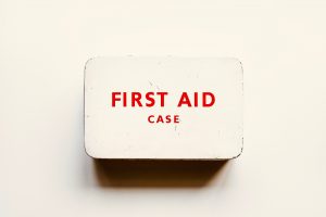 White metal first aid tin on a white background